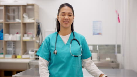 Smile,-healthcare-and-an-asian-woman-vet-arms