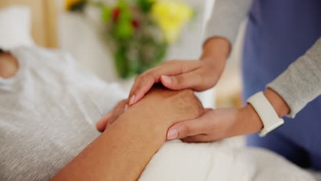 Senior-woman,-hand-holding-and-nurse-in-bed