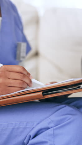 Woman,-doctor-and-hands-writing-prescription