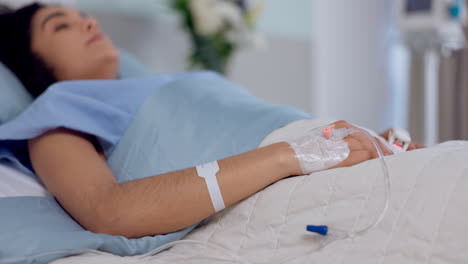 Hospital-bed,-emergency-and-nervous-woman-with-iv