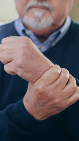 Hands,-injury-and-senior-man-with-wrist