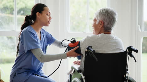 Blood-pressure,-nurse-and-senior-woman