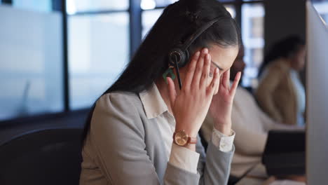 Woman,-call-centre-or-headache-in-office