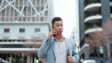 Businessman,-phone-call-and-walking-in-city