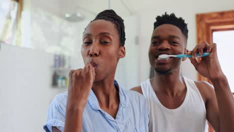 Home,-brushing-teeth-and-black-couple