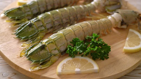 fresh-mantis-shrimp-with-lemon-on-wood-board