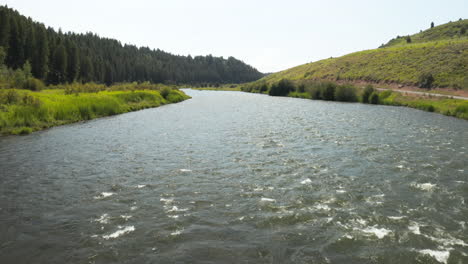 Low-Flying-Drone-Footage-along-river-at-Henry's-Fork-River-at-Southeastern-Idaho,-USA