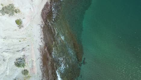 Oceanscape-of-Turquoise-Color-Ocean-Water-on-Mexico-Coast---Aerial-Overhead-Drone-View