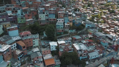 Drone-aerial-landscape-view-of-houses-in-ghetto-neighborhood,-comuna-13-slums,-Medellin,-Colombia