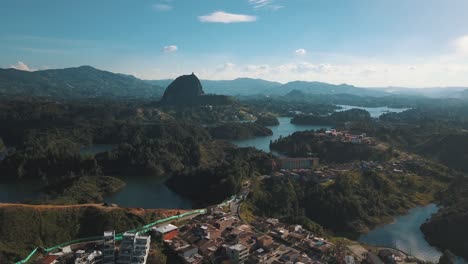 Drone-aerial-view-of-El-Peñón-rock-in-Guatapé-and-the-beautiful-lake-in-Colombia