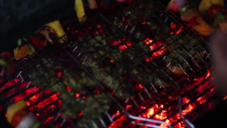 Close-up-of-barbecue-grill-with-veggie-skewers