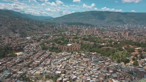 Drone-aerial-view-from-comuna-13-slums-and-Medellin-city-in-Colombia