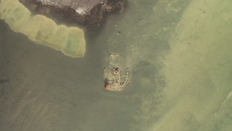 Revealing-Top-Shot-Of-FV-Clyne-Castle-Steam-Trawler-Wreck-In-Breidamerkursandur,-South-Coast-Of-Iceland---aerial-drone