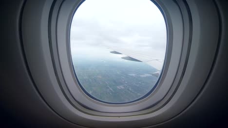 Zooming-into-view-out-of-plane-window-while-travelling-onto-next-adventure