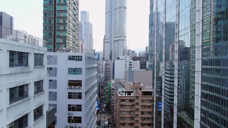 Central-Hong-Kong,-Aerial-view-of-traffic-and-city-skyscrapers