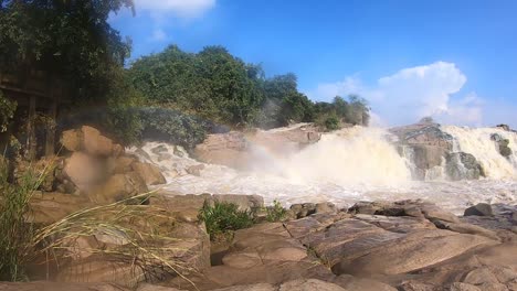 Time-lapse-of-rainbow-forming-over-waterfalls-at-Usri-Falls-in-Giridih,-Jharkhand,-India-on-Tuesday-6th-October,-2020