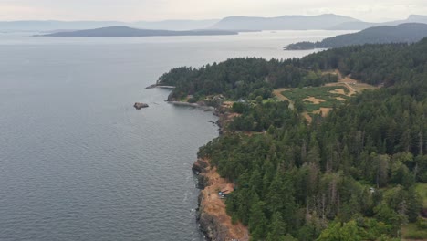 Drone-Aerial-Shot-around-the-natural-beautiful-shoreline-of-West-Vancouver,-Canada
