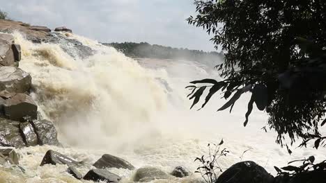 Heavy-flow-of-water-dropping-off-of-waterfalls-of-Usri-River-after-rain-at-Usri-Falls-in-Giridih,-Jharkhand,-India-on-Tuesday-6th-October-2020