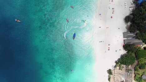 Birds-Eye-Aerial-Shot-of-Jet-Ski-on-Zanzibar-Nungwi-Beach