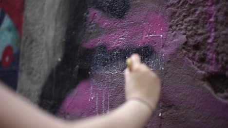 Liquid-Glue-Being-Applied-To-An-Urban-Wall-With-A-Brush