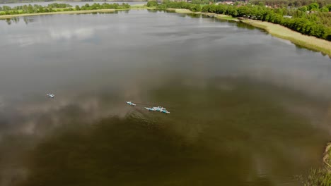 Tourists-Kayaking-On-Pristine-Lake-On-National-Park-Near-Styporc,-Pomeranian-Voivodeship-In-Northern-Poland