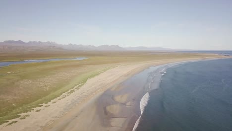 Aerial-Footage-of-Rare-Golden-Sandy-Beach-and-Calm-Waves-During-Sunny-Summer-In-Snaefellsness-Peninsula,-Iceland