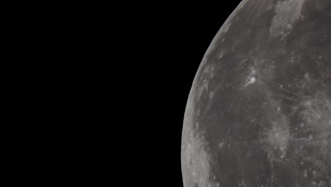 a-super-telephoto-video-of-The-giant-full-Moon-passing-through-the-night-sky-in-space-taken-with-a-telescope