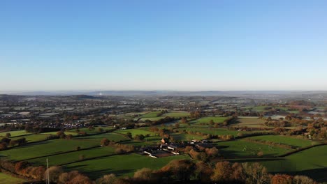 Aerial-rotating-view-looking-across-the-Culm-Valley-from-Culmstock-Beacon-Devon-England