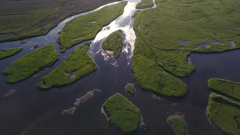 Aerial-Footage-of-Green-Islands-on-a-River-Delt-by-During-Sunny-Summer-In-Snaefellsness-Peninsula,-Iceland
