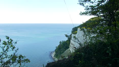 Wide-view-of-the-open-ocean-from-the-tops-of-Mons-Klint,-Denmark's-white-chalk-cliffs-in-the-southern-part-of-the-country