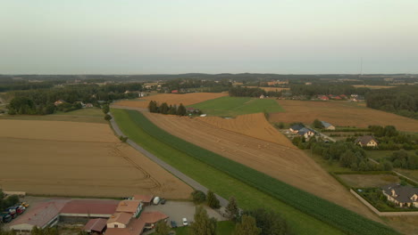 Beautiful-green-farmlands-of-Kielno,-Poland--aerial