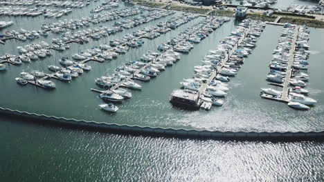 Aerial-view-of-marina-a-dock---yachts-and-small-boats