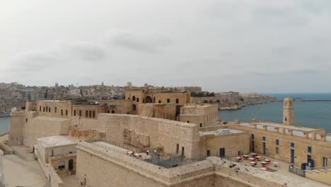 Aerial-4k-drone-footage-flying-over-an-old-fortified-city-on-the-island-of-Malta-of-the-Mediterranean-Sea