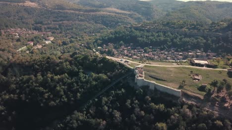 Forward-tilting-drone-shot-over-a-hill-with-an-archeological-site-in-Bulgaria