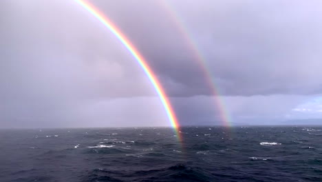 Beautiful---rare-double-rainbow-over-the-ocean-from-cruise-ship-in-North-Sea-off-coast-of-Norway-at-Arctic-Circle-Longer-shot-1080p