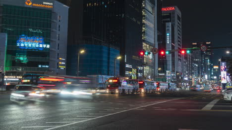 Static-timelapse-of-busy-intersection-near-Gangnam-Station-at-night