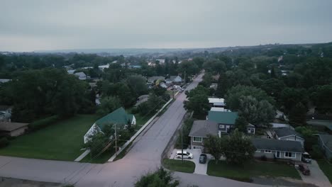 Family-housing-development-is-quiet-and-isolated-on-a-gloomy-day-|-aerial
