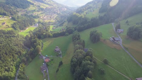 Aerial-footage-over-a-lush-green-alpine-valley