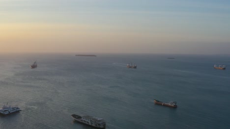 Wide-View-Of-Boats-On-Ocean-And-Island