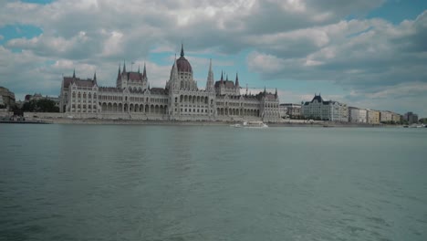 Boat-ride-through-Danube,-passing-by-Budapest-parliament,-getting-closer