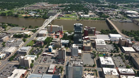 Aerial-View-of-Downtown-Little-Rock-City-and-Bridges-Above-Arkansas-River,-USA