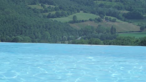 Luxurious-infinity-pool-on-the-hillside-of-resort-in-Umbertide,-Perugia,-Italy,-South-Europe