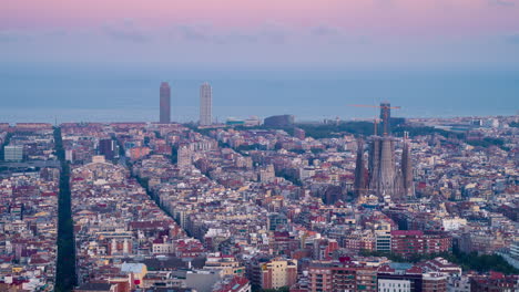Timelapse-of-Barcelona-at-sunset-seen-from-the-Turó-de-la-Rovira-or-Bunkers-del-Carmel
