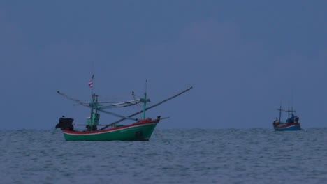 Fishing-Boats-in-Thailand-wait-in-the-middle-of-the-ocean-for-dark-to-come-so-they-can-turn-on-their-green-lights-and-start-fishing-and-troll-for-shrimps