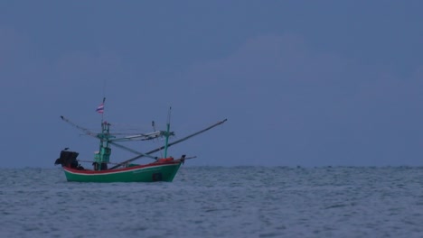 Fishing-Boats-in-Thailand-wait-in-the-middle-of-the-ocean-for-dark-to-come-so-they-can-turn-on-their-green-lights-and-start-fishing-and-troll-for-shrimps