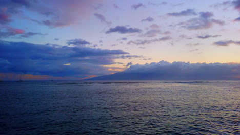 Beautiful-pan-from-Lahaina-harbor-sailboats-past-Lanai-Island-to-gorgeous-Maui-sunset-on-Pacific-Ocean-in-Hawaii-4k-ProRezHQ