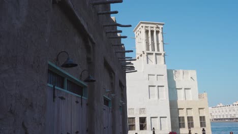 Traditional-Buildings-With-Wind-Tower-In-Historical-Neighborhood-Of-Al-Fahidi,-Dubai-UAE-On-A-Sunny-Day
