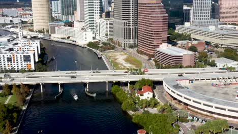 Downtown-City-Traffic-and-Buildings-of-Tampa-Bay,-Florida---Aerial-Reveal