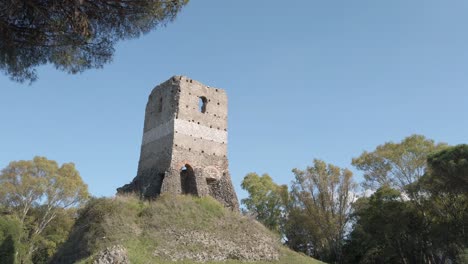 Passing-by-The-tower-Torre-selce-from-the-appian-way-on-a-sunny-day