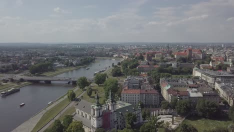 Poland,-Krakow-drone-shot-zooming-out-followed-by-Wisla-to-general-shoot